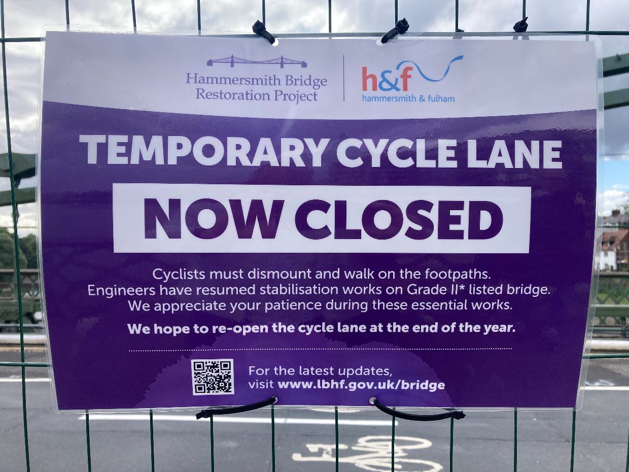 A sign on Hammersmith Bridge